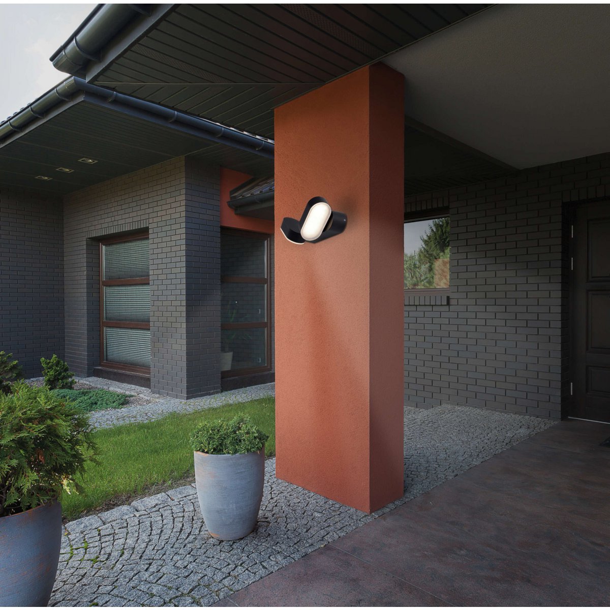 LED Outer Wall Lamp "Motus" gemaakt van metaal en plastic in het zwart, met geïntegreerde LED